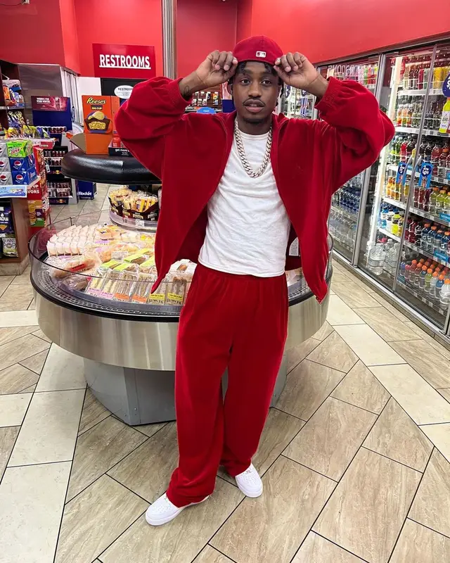 Lil Tjay outfit in Balenciaga, Nike, and New Era, 2022