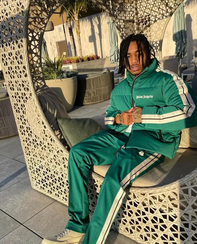 DDG outfit in Moncler, Alexander McQueen, and Palm Angels, 2022