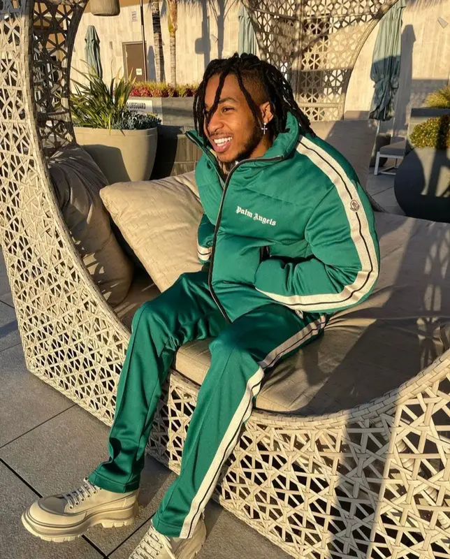 DDG outfit in Moncler, Alexander McQueen, and Palm Angels, 2022