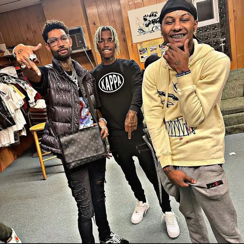 PnB Rock outfit in Dior, Louis Vuitton, and Chrome Hearts, 2022