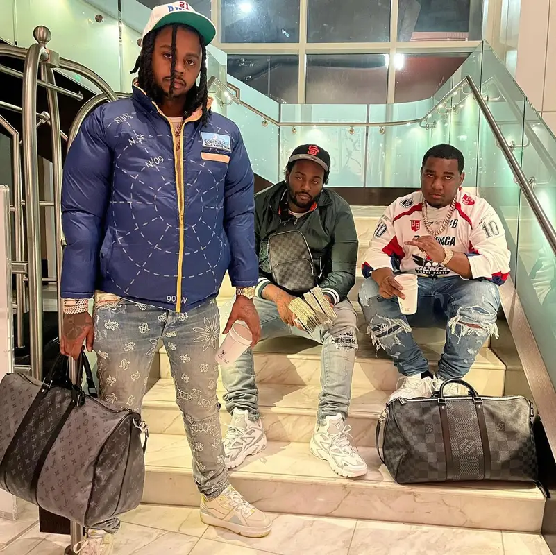 Peezy outfit in Gucci, Amiri, and Louis Vuitton, 2022