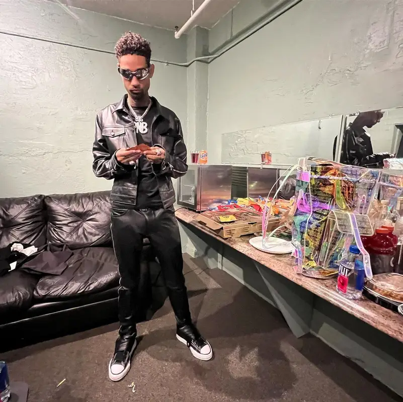 PnB Rock outfit in Cease±Desist, Maison Mihara Yasuhiro, and Balenciaga, 2022