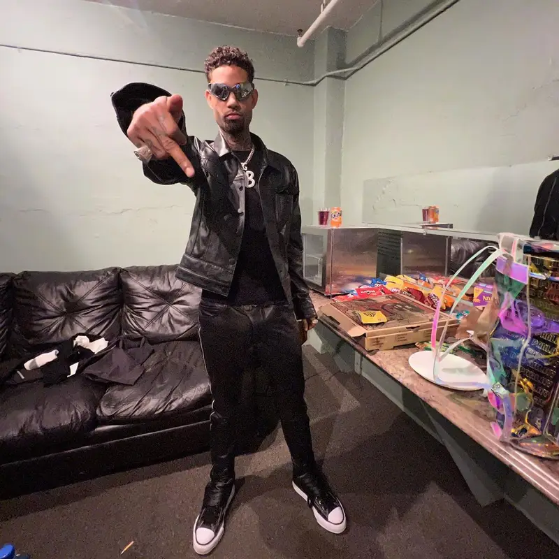 PnB Rock outfit in Cease±Desist, Maison Mihara Yasuhiro, and Balenciaga, 2022
