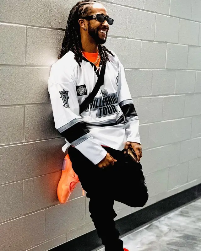 Omarion outfit in Fear of God, Gucci, and Nike, 2021