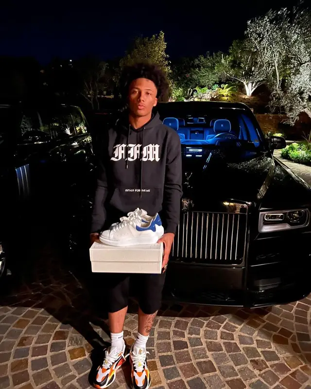 Mikey outfit in Alexander McQueen, Pusha T Merch, and Puma, 2022
