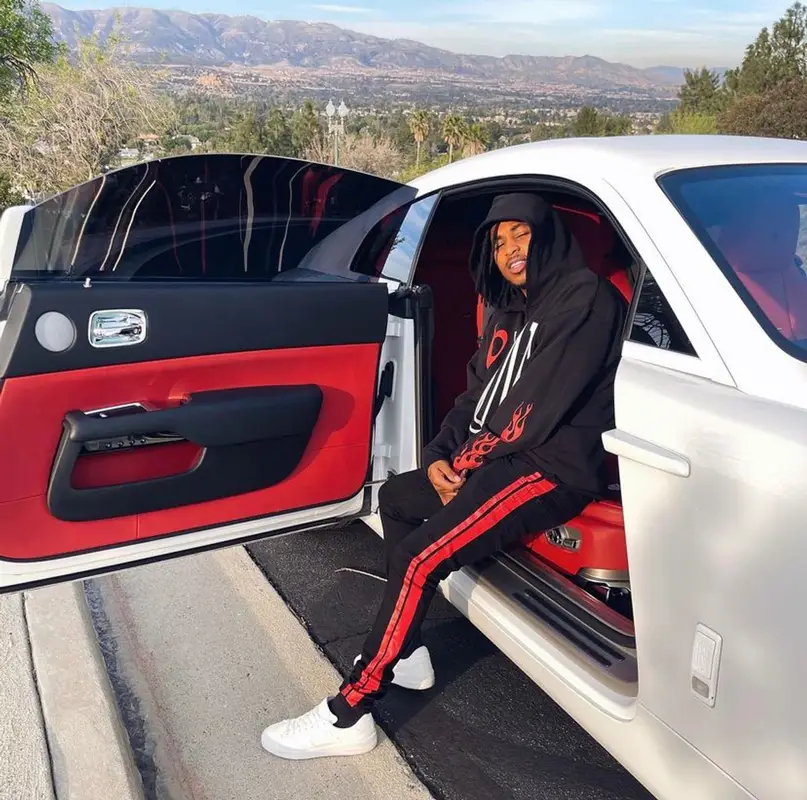 DDG outfit in Vlone, Amiri, and Palm Angels, 2022