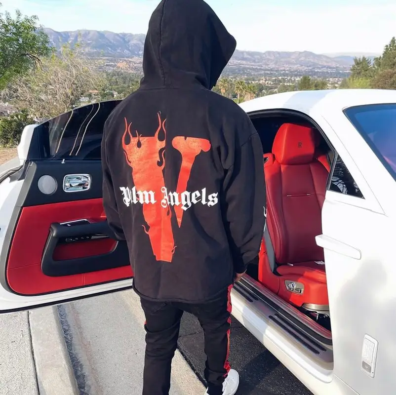 DDG outfit in Vlone, Amiri, and Palm Angels, 2022
