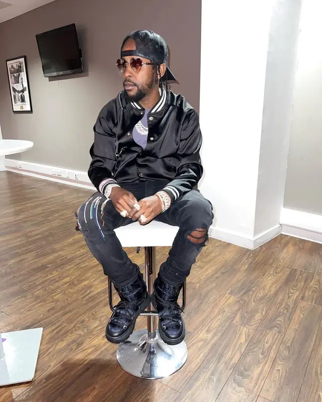 Popcaan outfit in Amiri and Dior, 2022