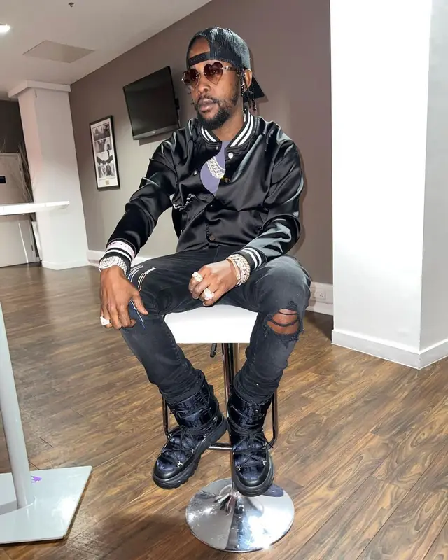 Popcaan outfit in Amiri and Dior, 2022
