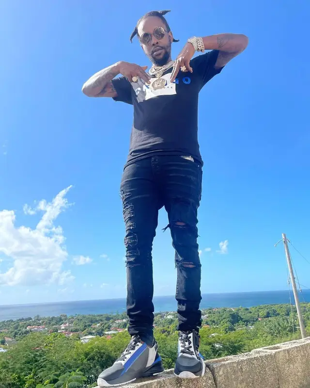 Popcaan outfit in Okaigo, Amiri, and Fendi, 2021