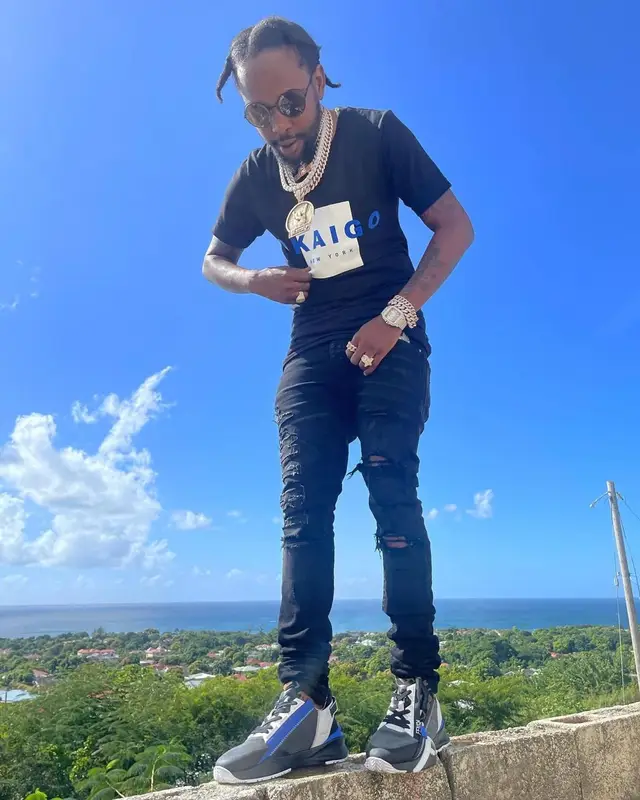 Popcaan outfit in Okaigo, Amiri, and Fendi, 2021