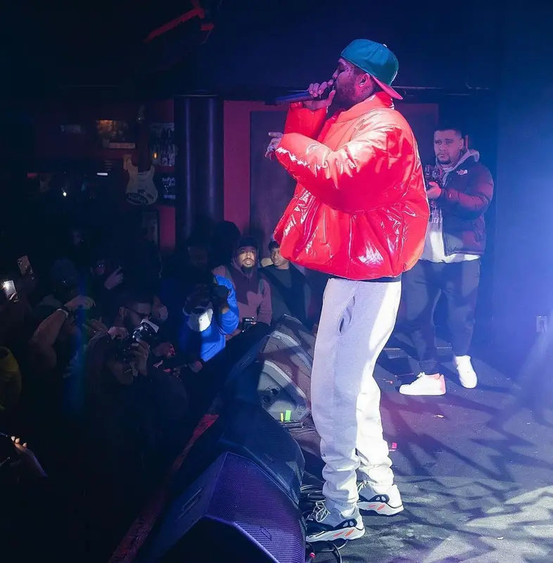 Dave East outfit in Yeezy, Fear of God, and GAP, 2022