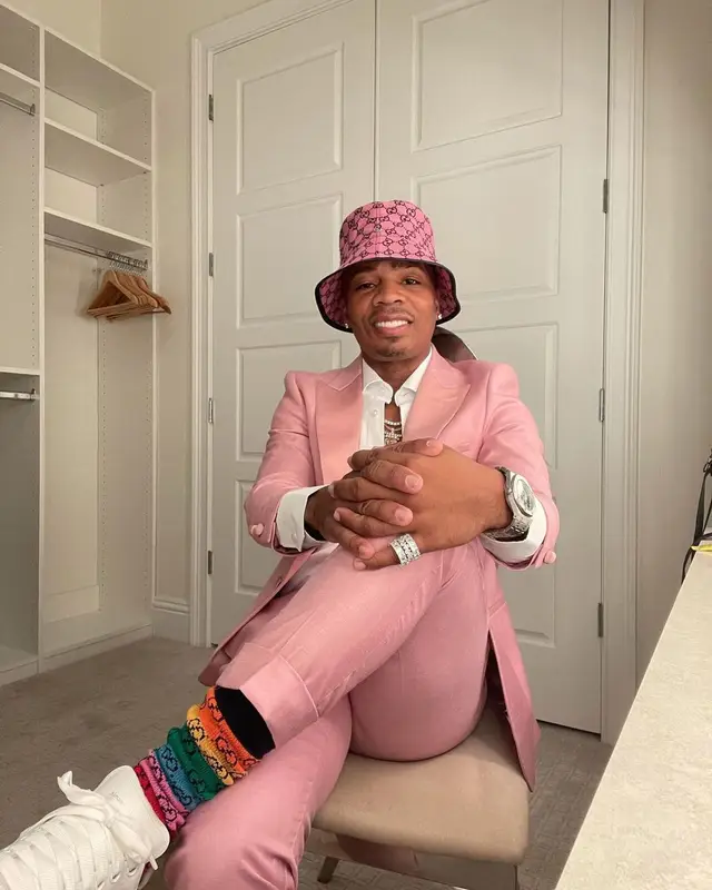 Plies outfit in Dolce & Gabbana, Versace, and Gucci, 2021