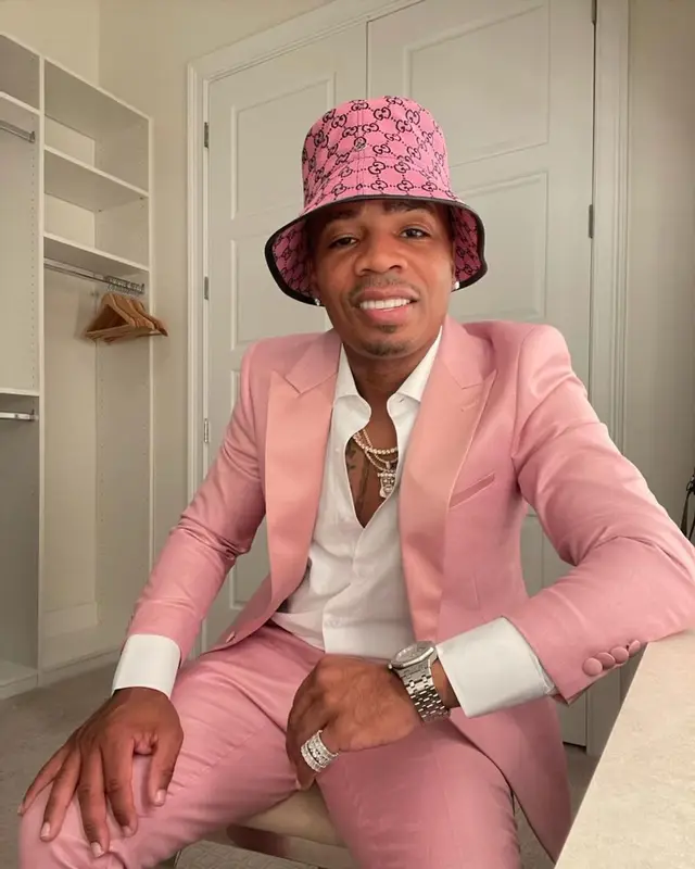 Plies outfit in Dolce & Gabbana, Versace, and Gucci, 2021