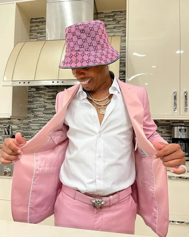 Plies outfit in Dolce & Gabbana, Versace, and Gucci, 2021