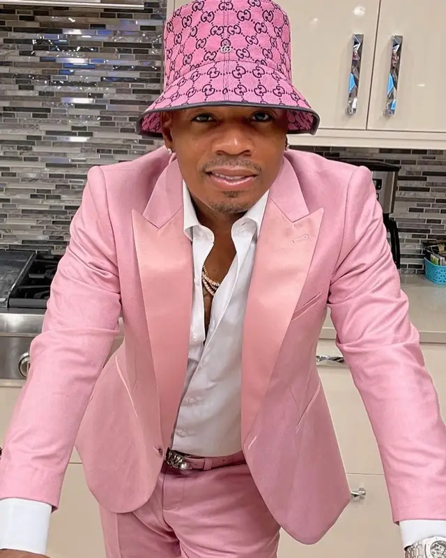 Plies outfit in Dolce & Gabbana, Versace, and Gucci, 2021