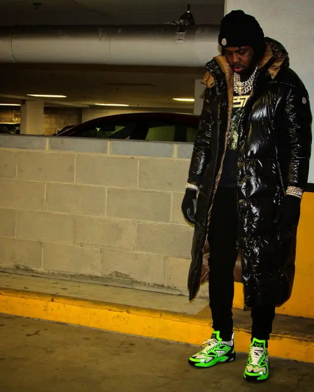 EST Gee outfit in Amiri, Louis Vuitton, and Moncler, 2022
