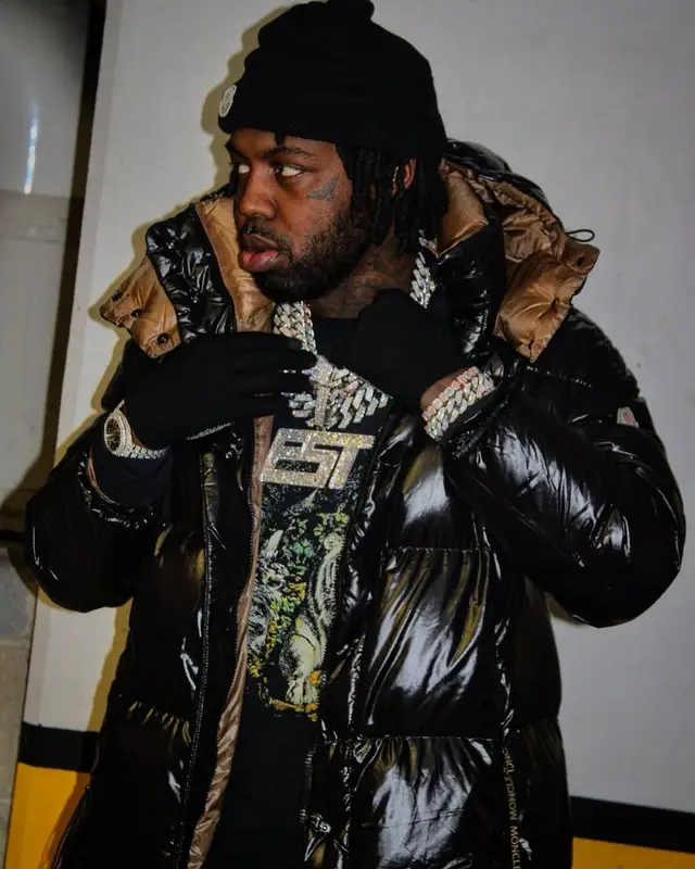 EST Gee outfit in Amiri, Louis Vuitton, and Moncler, 2022