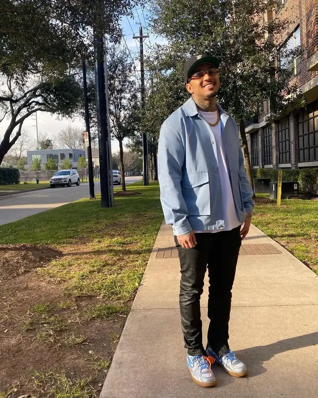 Kirko Bangz outfit in Cartier, Fear of God, and New Era, 2022
