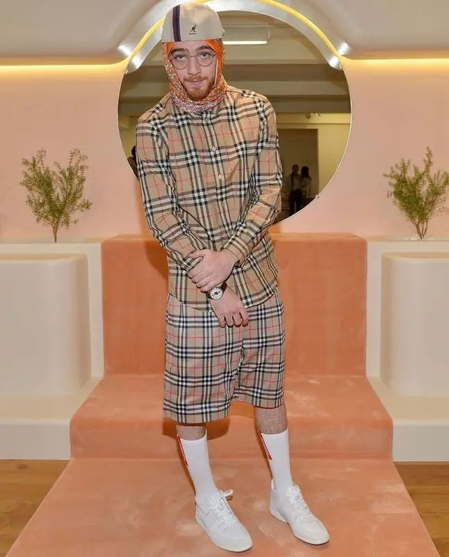 Angus Cloud outfit in Coach, Kangol, and Burberry, 2022