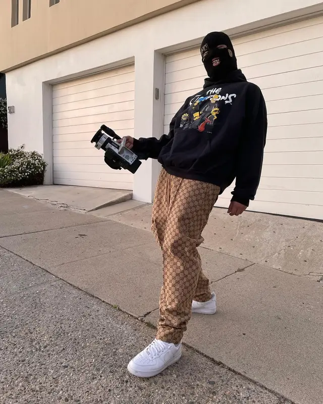Lil Toe outfit in Balenciaga, Gucci, and Canon, 2022