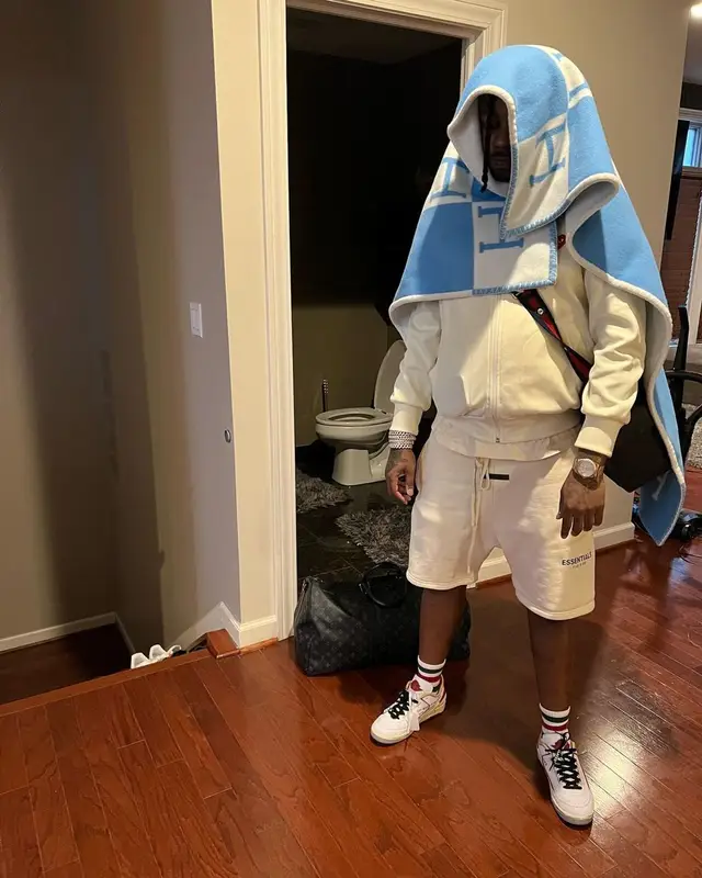 Babyface Ray outfit in Comme Des Garcons, Fear of God, and Jordan, 2022