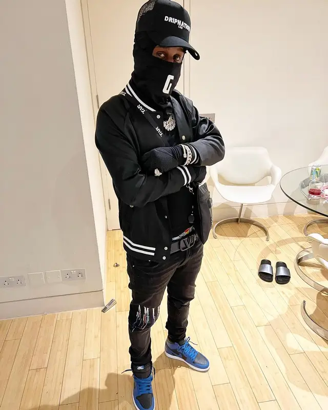 Popcaan outfit in The Couture Club, Amiri, and Valentino, 2022