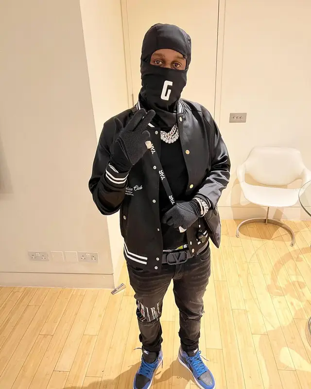 Popcaan outfit in The Couture Club, Amiri, and Valentino, 2022