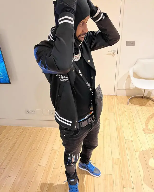 Popcaan outfit in The Couture Club, Amiri, and Valentino, 2022