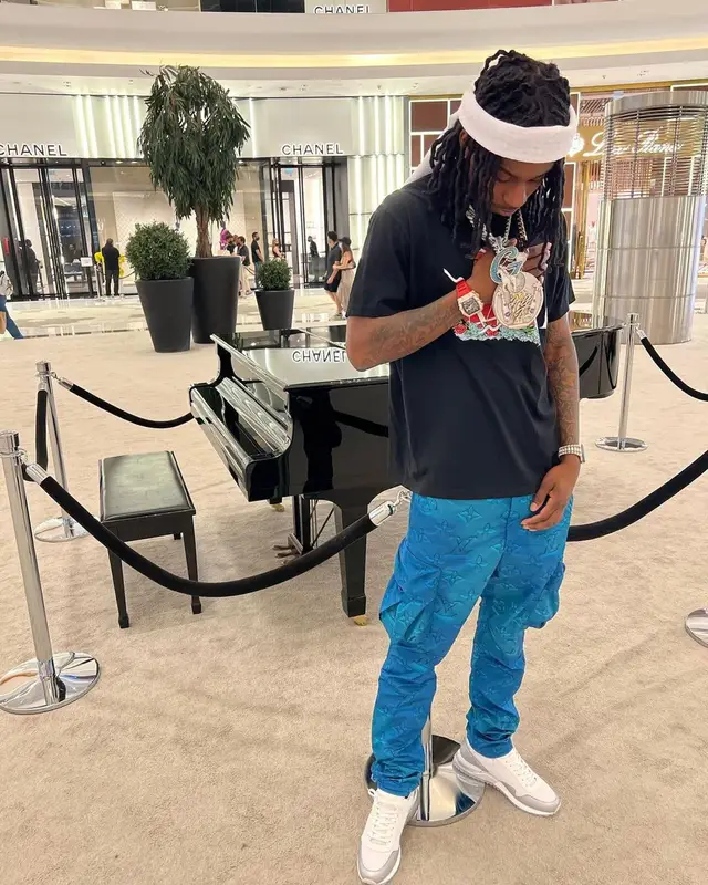 Polo G outfit in Amiri and Louis Vuitton, 2022