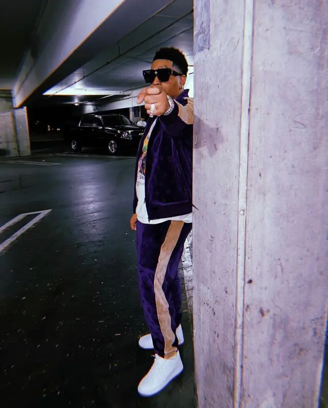 Lil Gotit outfit in OVO, Purple Brand, and Louis Vuitton, 2022
