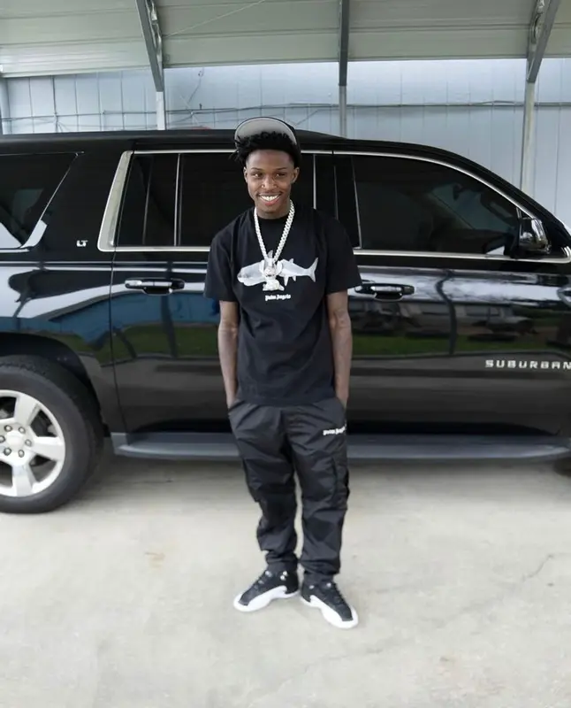 Quando Rondo outfit in Palm Angels, Jordan, and New Era, 2022