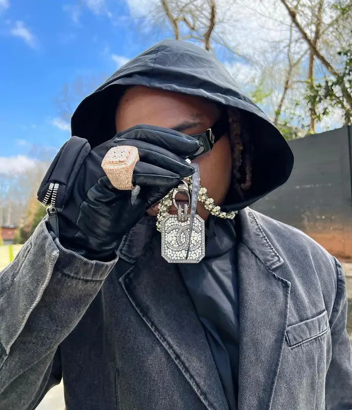Gunna outfit in Diesel, Dior, and Prada, 2022