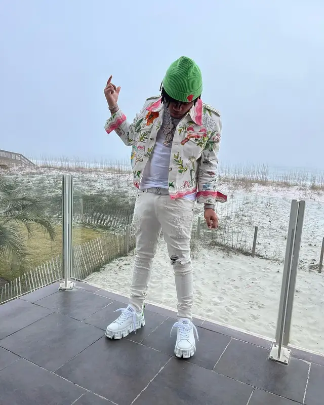 No Cap outfit in Casablanca, Louis Vuitton, and Versace, 2022