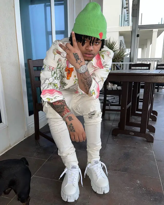 No Cap outfit in Casablanca, Louis Vuitton, and Versace, 2022