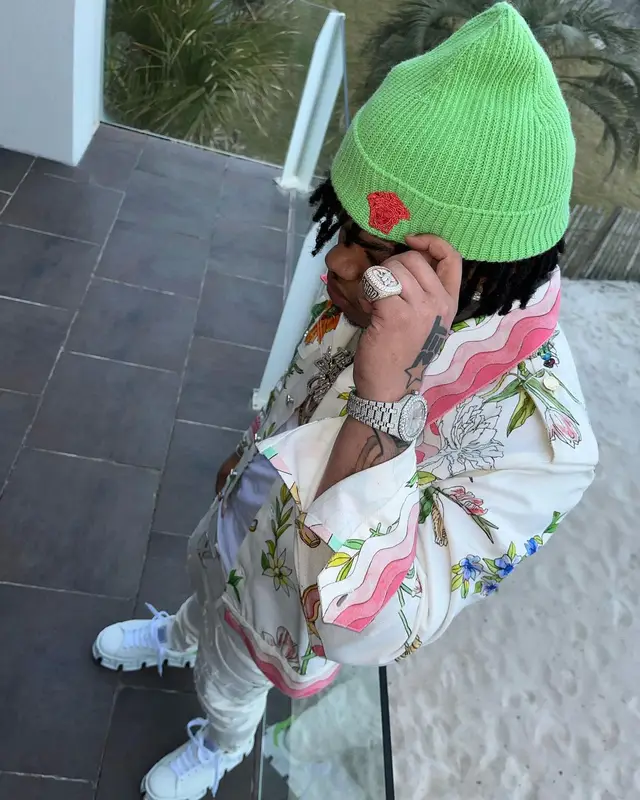 No Cap outfit in Casablanca, Louis Vuitton, and Versace, 2022