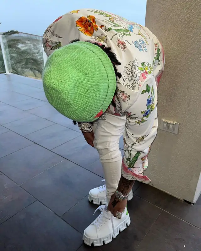 No Cap outfit in Casablanca, Louis Vuitton, and Versace, 2022