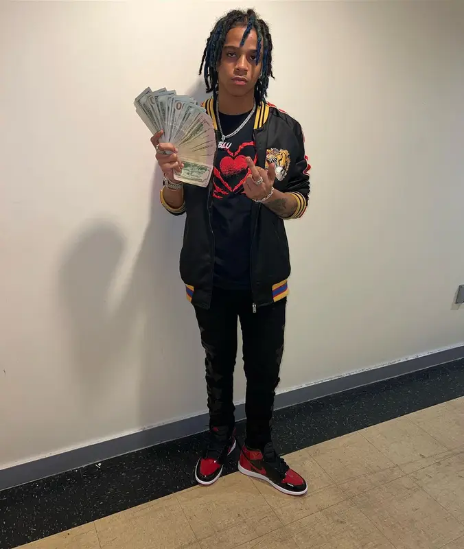 C Blu outfit in Gucci, Hot Topic, and Amiri, 2022