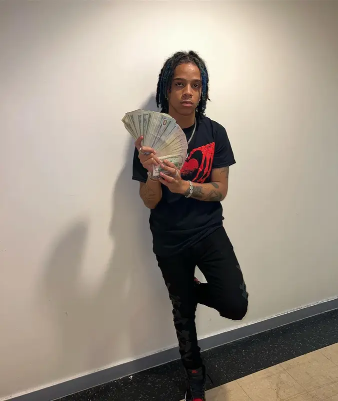 C Blu outfit in Gucci, Hot Topic, and Amiri, 2022