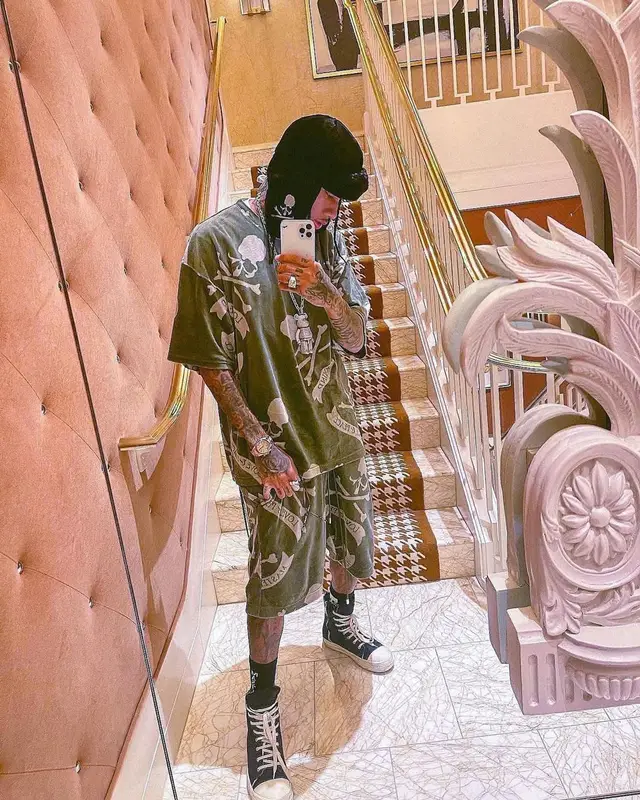 Tyga outfit in Rick Owens, Louis Vuitton, and Mastermind, 2022