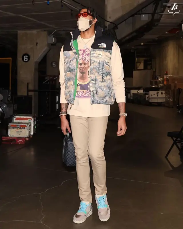 Anthony Davis outfit in Gucci, The North Face, and Henry Mask, 2022