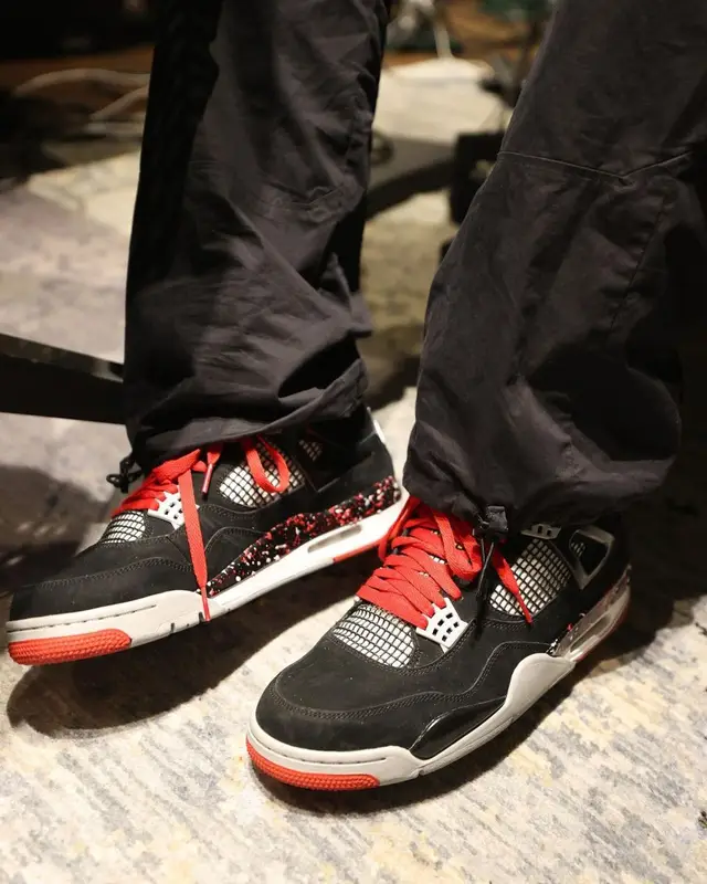 DJ Khaled outfit in Prada, Jordan, and OVO, 2022