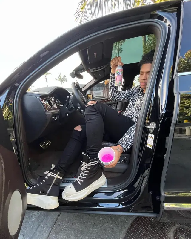 K Suave outfit in Dior, Amiri, and Fanta, 2022