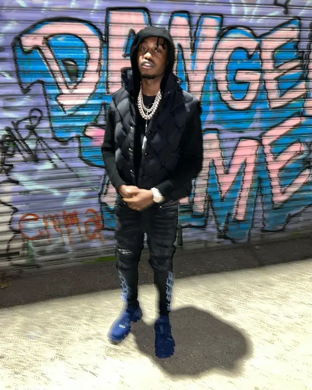 Lil Tjay outfit in Bottega Veneta, Dior, and Amiri, 2022