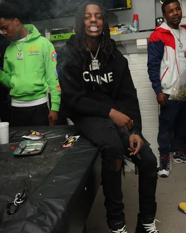 OMB Peezy outfit in Celine, Amiri, and Alexander McQueen, 2022