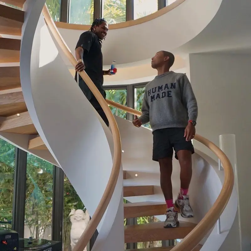 Pharrell Williams outfit in Human Made, Noah, and Balenciaga, 2022