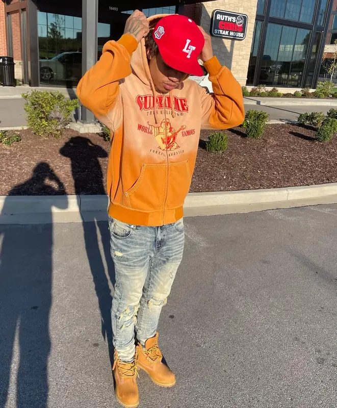 30 Deep Grimeyy outfit in Supreme, Timberland, and True Religion, 2021