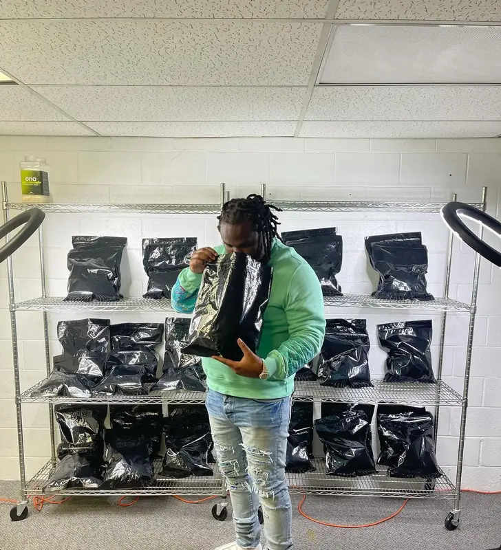 Tee Grizzley outfit in Amiri and Nike, 2022