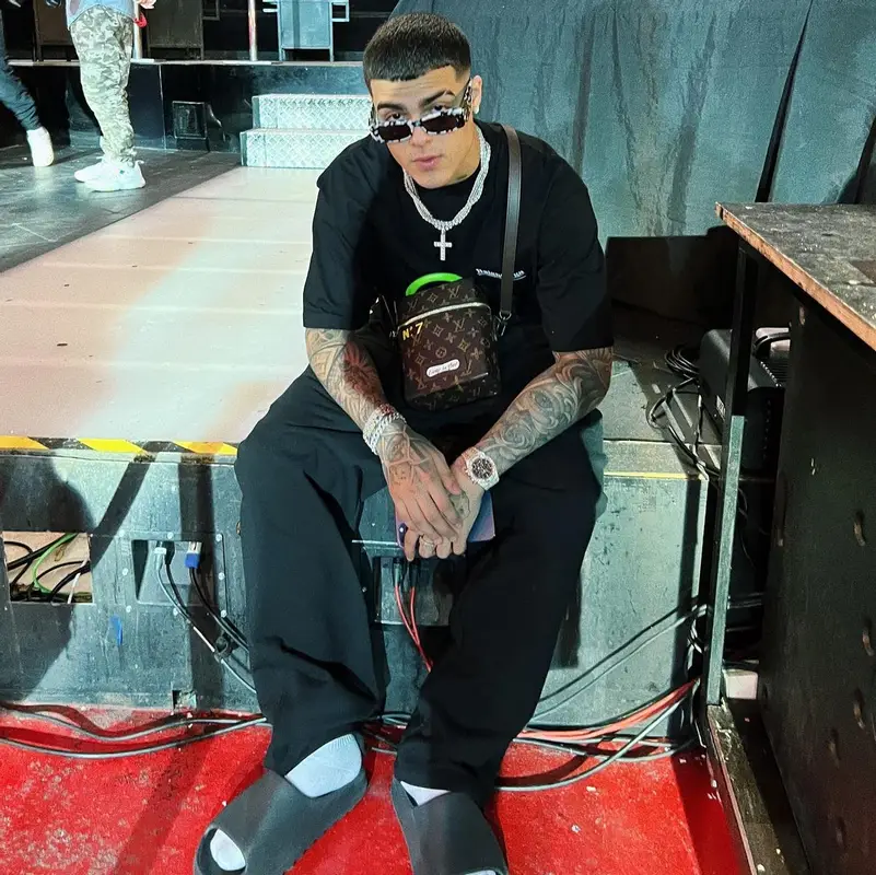 Lunay outfit in Louis Vuitton, Balenciaga, and Yeezy, 2022