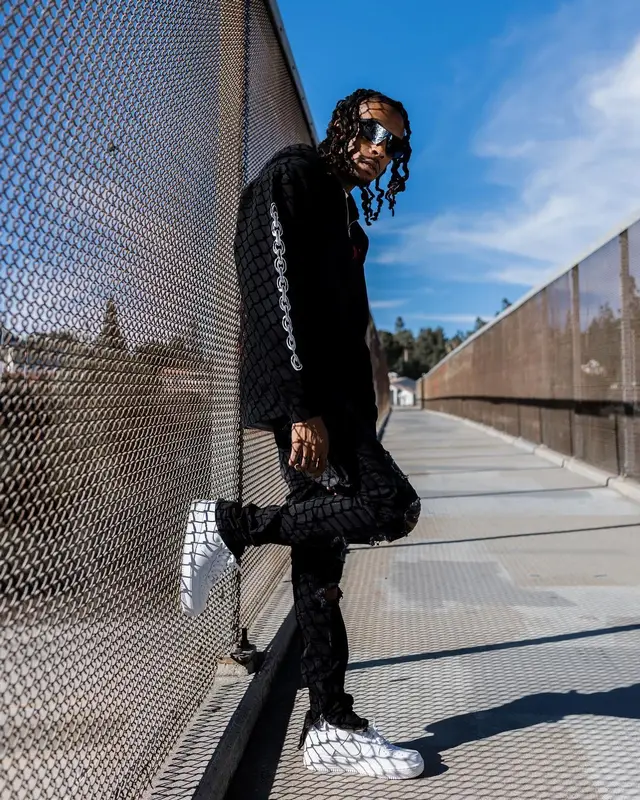 Chris Travis outfit in FashionNova and Nike, 2022